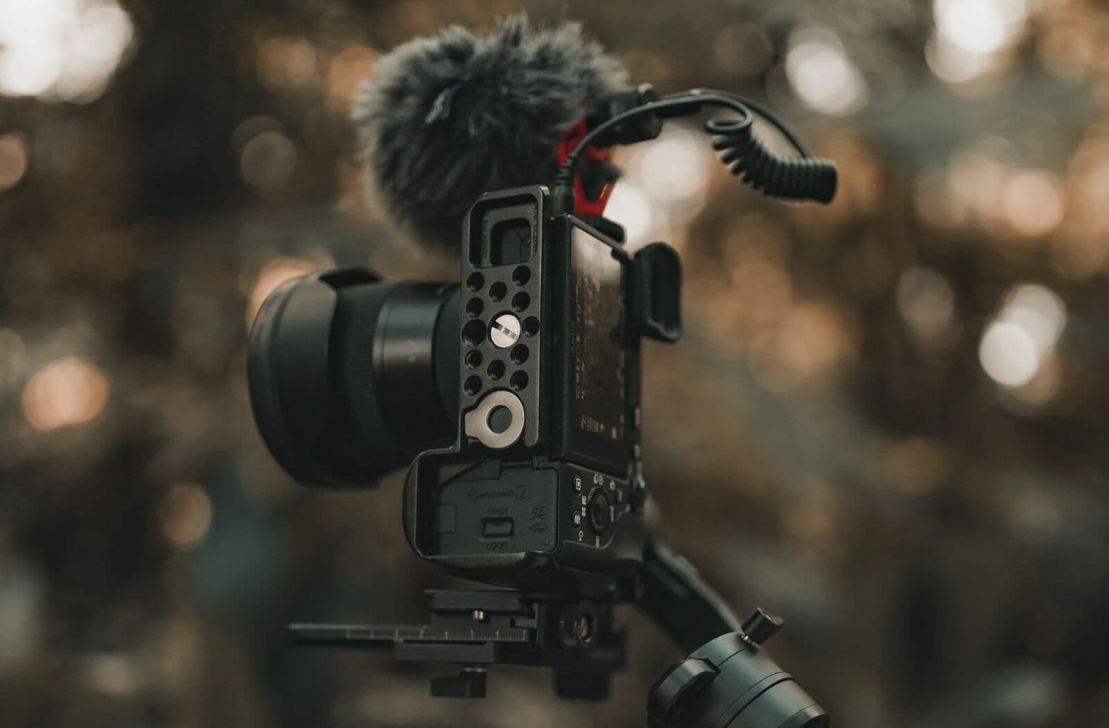 A wedding videographer capturing footage on a camera gimbal